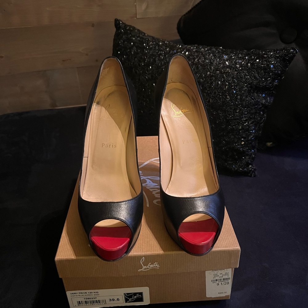 Christian Louboutin Peeps, great condition, small scratch on one heel.
